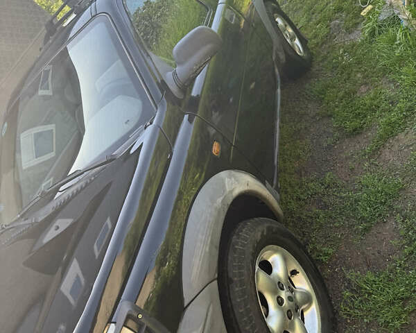 Чорний Ленд Ровер Freelander, об'ємом двигуна 1.8 л та пробігом 290 тис. км за 5350 $, фото 4 на Automoto.ua