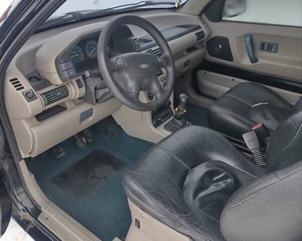 Черный Ленд Ровер Фрилендер, объемом двигателя 1.8 л и пробегом 222 тыс. км за 7500 $, фото 9 на Automoto.ua