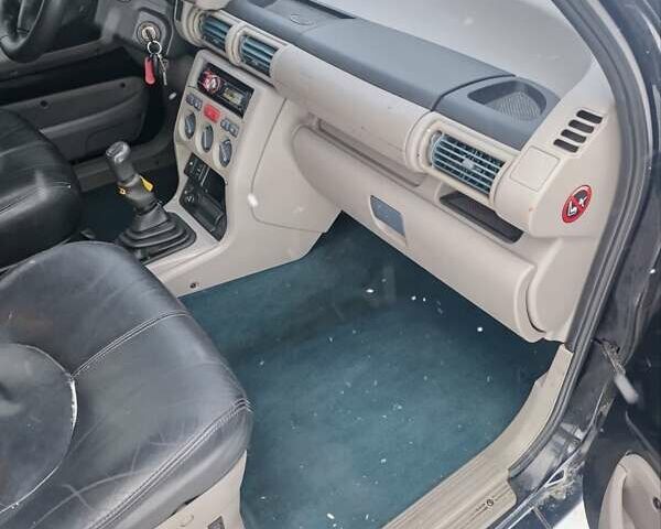 Черный Ленд Ровер Фрилендер, объемом двигателя 1.8 л и пробегом 222 тыс. км за 7500 $, фото 6 на Automoto.ua