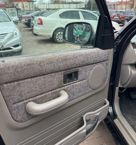 Черный Ленд Ровер Фрилендер, объемом двигателя 1.8 л и пробегом 340 тыс. км за 4400 $, фото 13 на Automoto.ua