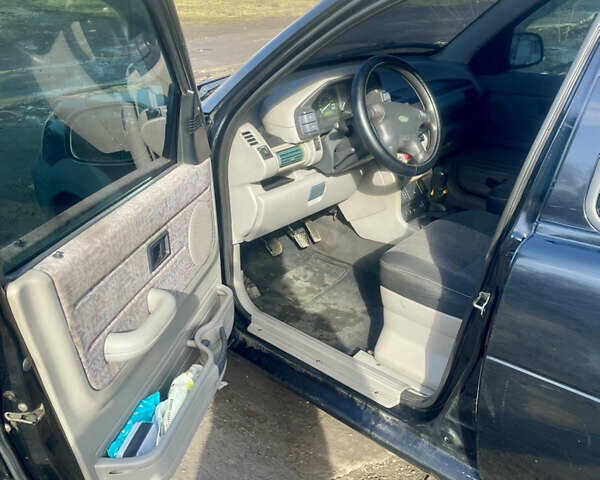 Черный Ленд Ровер Фрилендер, объемом двигателя 1.8 л и пробегом 273 тыс. км за 4900 $, фото 12 на Automoto.ua