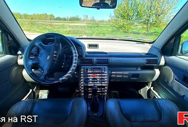 Чорний Ленд Ровер Freelander, об'ємом двигуна 2.5 л та пробігом 192 тис. км за 4500 $, фото 2 на Automoto.ua