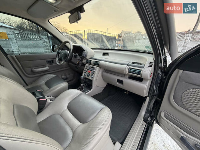 Черный Ленд Ровер Фрилендер, объемом двигателя 2.5 л и пробегом 114 тыс. км за 6990 $, фото 13 на Automoto.ua