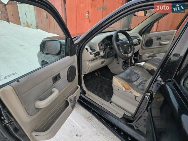 Черный Ленд Ровер Фрилендер, объемом двигателя 2 л и пробегом 380 тыс. км за 3500 $, фото 8 на Automoto.ua