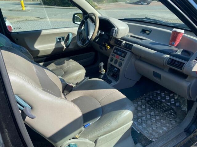 Чорний Ленд Ровер Freelander, об'ємом двигуна 2 л та пробігом 243 тис. км за 1875 $, фото 4 на Automoto.ua