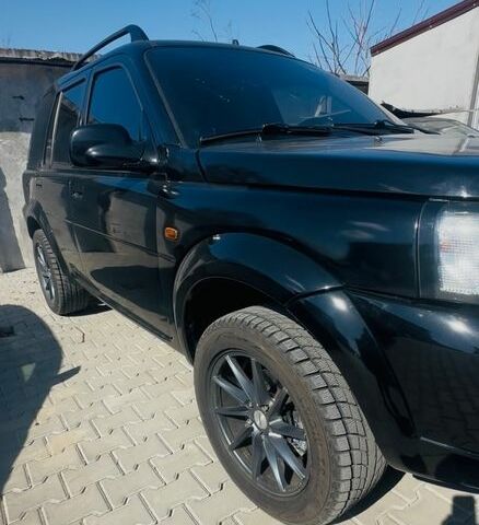 Черный Ленд Ровер Фрилендер, объемом двигателя 1.95 л и пробегом 270 тыс. км за 4800 $, фото 6 на Automoto.ua