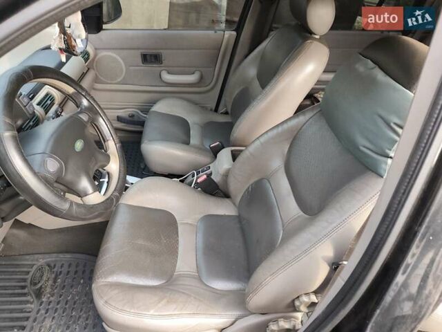 Черный Ленд Ровер Фрилендер, объемом двигателя 2 л и пробегом 278 тыс. км за 3500 $, фото 6 на Automoto.ua