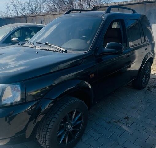 Черный Ленд Ровер Фрилендер, объемом двигателя 1.95 л и пробегом 270 тыс. км за 4800 $, фото 4 на Automoto.ua