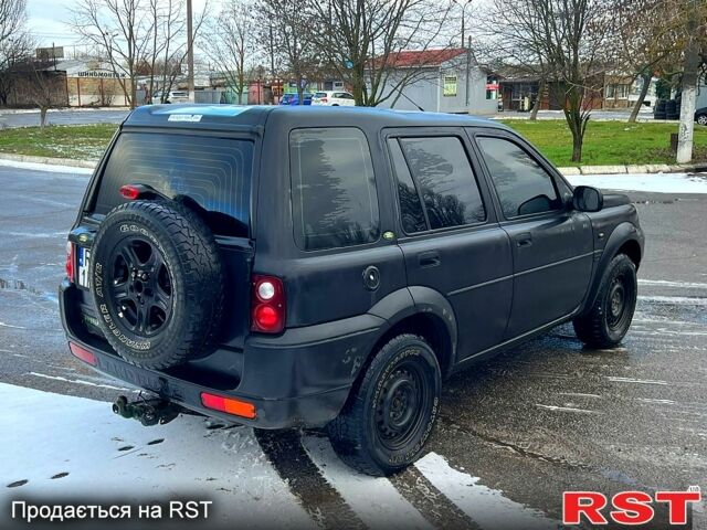 Черный Ленд Ровер Фрилендер, объемом двигателя 1.8 л и пробегом 200 тыс. км за 3300 $, фото 4 на Automoto.ua