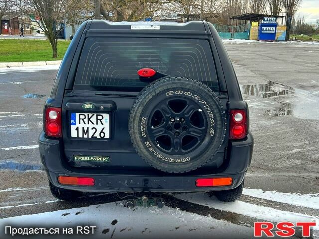 Черный Ленд Ровер Фрилендер, объемом двигателя 1.8 л и пробегом 200 тыс. км за 3300 $, фото 5 на Automoto.ua