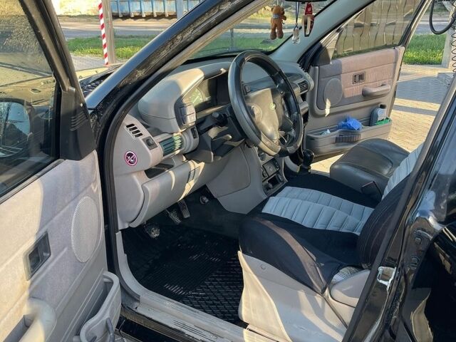 Чорний Ленд Ровер Freelander, об'ємом двигуна 1.95 л та пробігом 233 тис. км за 4700 $, фото 7 на Automoto.ua