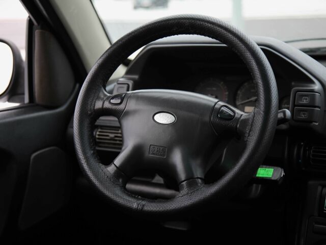 Черный Ленд Ровер Фрилендер, объемом двигателя 2 л и пробегом 234 тыс. км за 6600 $, фото 12 на Automoto.ua