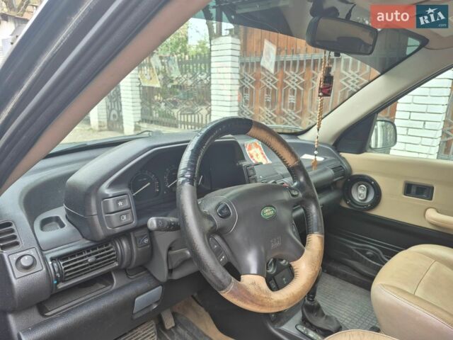 Чорний Ленд Ровер Freelander, об'ємом двигуна 2.5 л та пробігом 323 тис. км за 5000 $, фото 5 на Automoto.ua