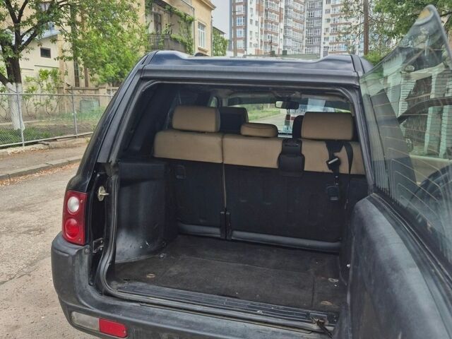 Чорний Ленд Ровер Freelander, об'ємом двигуна 2.5 л та пробігом 323 тис. км за 5000 $, фото 10 на Automoto.ua
