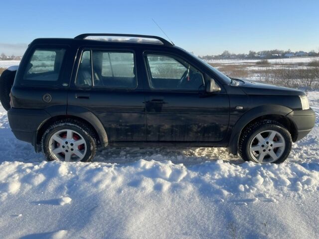 Черный Ленд Ровер Фрилендер, объемом двигателя 1.8 л и пробегом 230 тыс. км за 3600 $, фото 6 на Automoto.ua