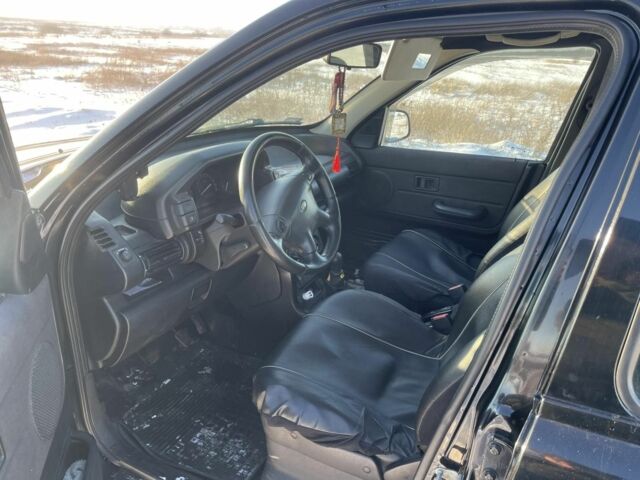 Черный Ленд Ровер Фрилендер, объемом двигателя 1.8 л и пробегом 230 тыс. км за 3600 $, фото 4 на Automoto.ua