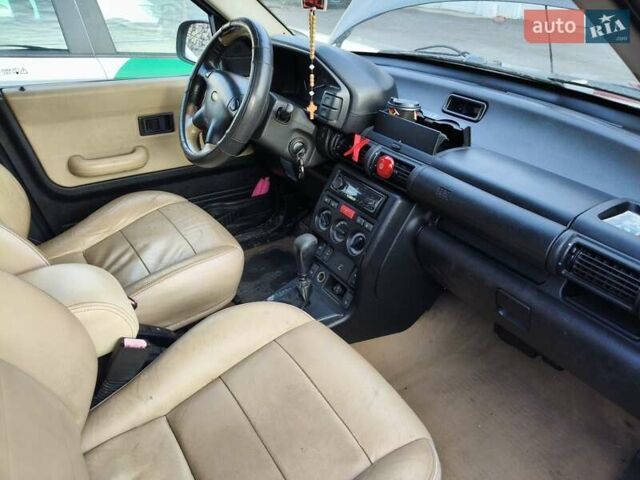 Черный Ленд Ровер Фрилендер, объемом двигателя 2.5 л и пробегом 305 тыс. км за 3300 $, фото 3 на Automoto.ua