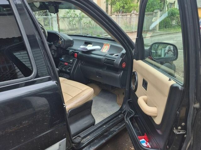 Чорний Ленд Ровер Freelander, об'ємом двигуна 2.5 л та пробігом 323 тис. км за 5000 $, фото 7 на Automoto.ua