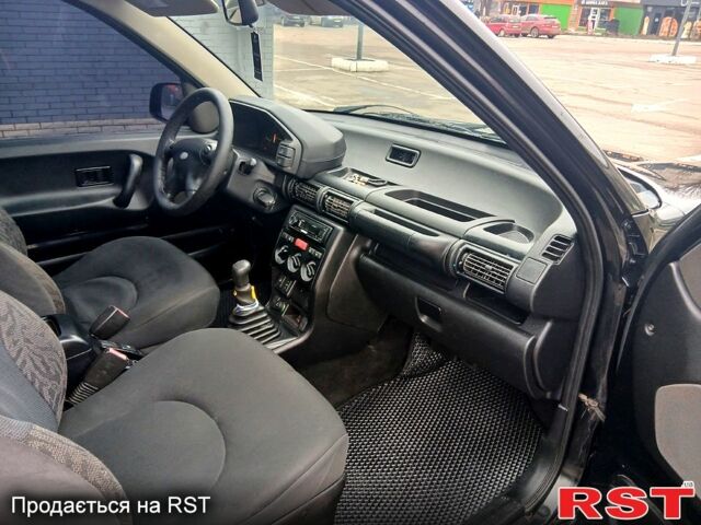 Чорний Ленд Ровер Freelander, об'ємом двигуна 2 л та пробігом 235 тис. км за 6200 $, фото 9 на Automoto.ua