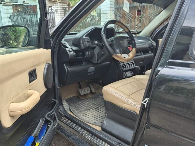 Чорний Ленд Ровер Freelander, об'ємом двигуна 2.5 л та пробігом 323 тис. км за 5000 $, фото 11 на Automoto.ua