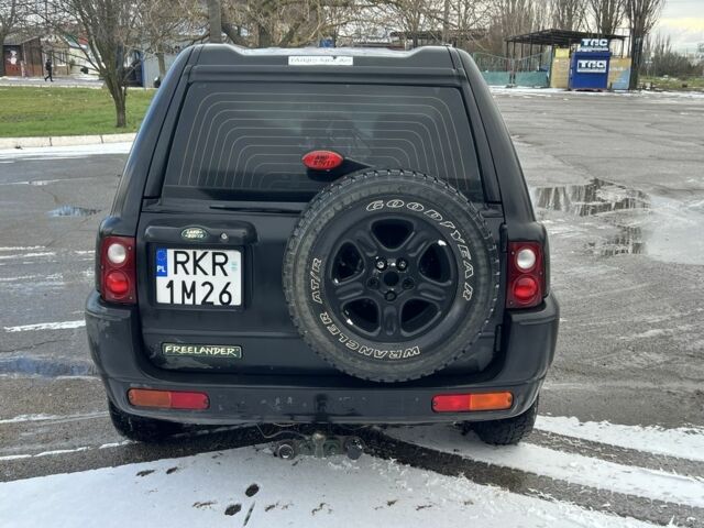 Черный Ленд Ровер Фрилендер, объемом двигателя 1.8 л и пробегом 120 тыс. км за 2900 $, фото 5 на Automoto.ua