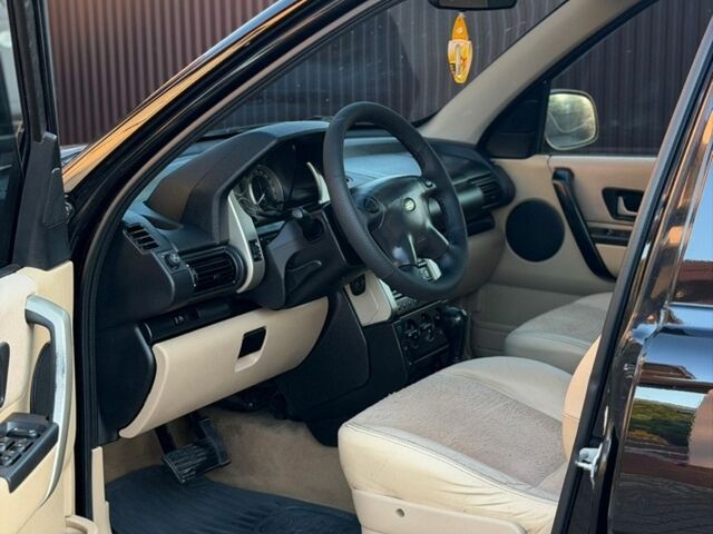 Чорний Ленд Ровер Freelander, об'ємом двигуна 1.95 л та пробігом 242 тис. км за 7500 $, фото 14 на Automoto.ua