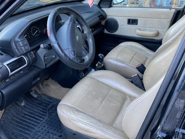 Черный Ленд Ровер Фрилендер, объемом двигателя 2 л и пробегом 197 тыс. км за 3144 $, фото 6 на Automoto.ua