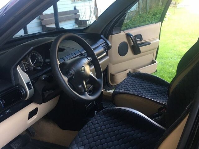 Чорний Ленд Ровер Freelander, об'ємом двигуна 1.95 л та пробігом 242 тис. км за 7500 $, фото 20 на Automoto.ua