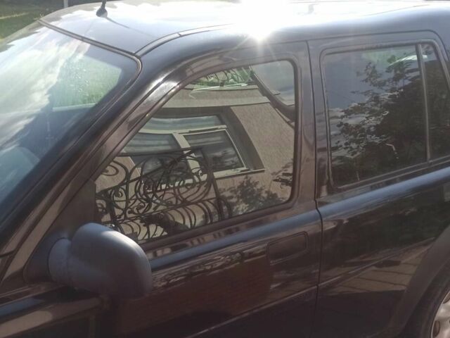 Чорний Ленд Ровер Freelander, об'ємом двигуна 1.8 л та пробігом 164 тис. км за 5000 $, фото 1 на Automoto.ua