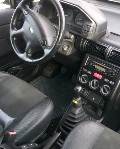 Черный Ленд Ровер Фрилендер, объемом двигателя 1.8 л и пробегом 337 тыс. км за 5100 $, фото 3 на Automoto.ua