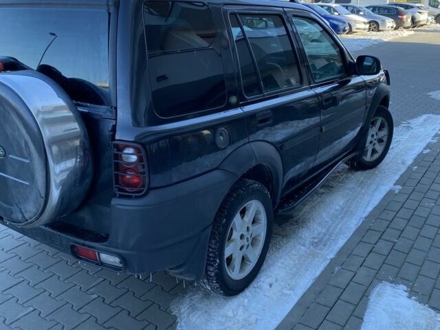 Черный Ленд Ровер Фрилендер, объемом двигателя 2 л и пробегом 197 тыс. км за 3144 $, фото 2 на Automoto.ua