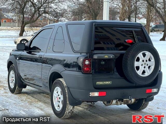 Черный Ленд Ровер Фрилендер, объемом двигателя 2 л и пробегом 225 тыс. км за 6500 $, фото 4 на Automoto.ua