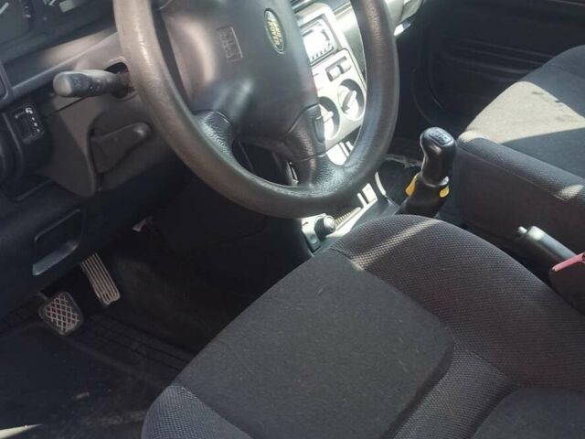 Чорний Ленд Ровер Freelander, об'ємом двигуна 1.8 л та пробігом 164 тис. км за 5000 $, фото 9 на Automoto.ua