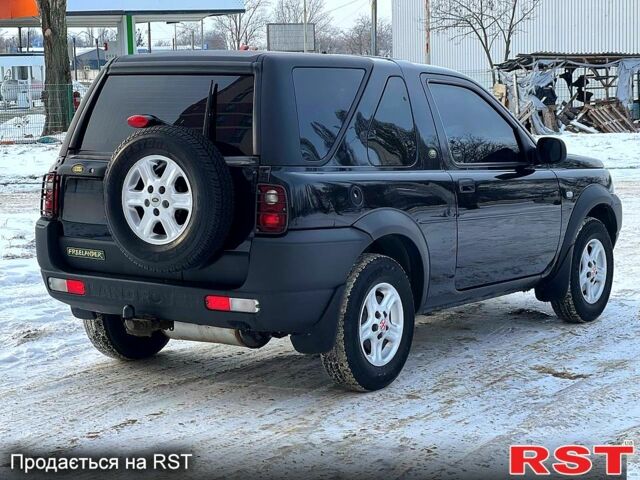 Черный Ленд Ровер Фрилендер, объемом двигателя 2 л и пробегом 235 тыс. км за 6500 $, фото 4 на Automoto.ua
