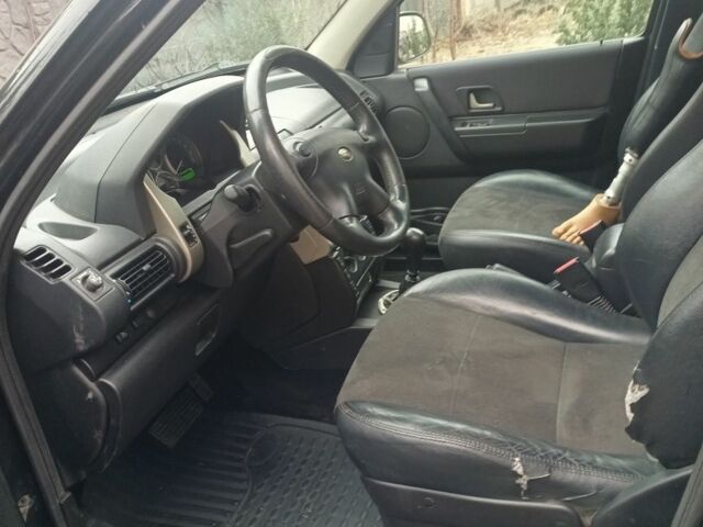 Черный Ленд Ровер Фрилендер, объемом двигателя 2 л и пробегом 259 тыс. км за 5777 $, фото 4 на Automoto.ua