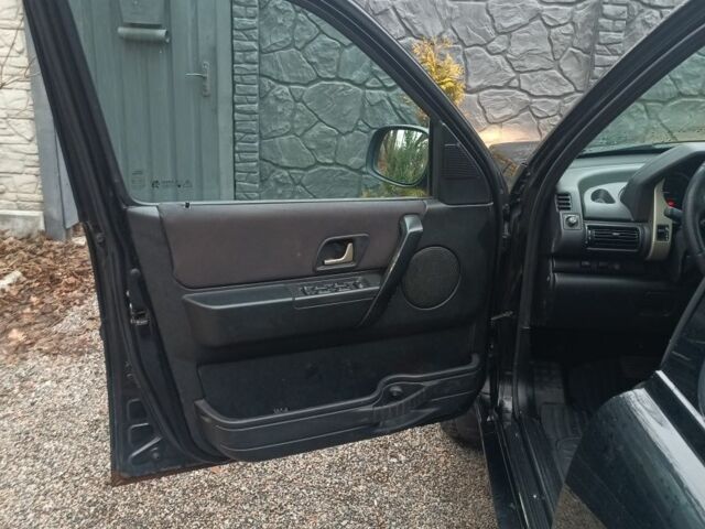 Черный Ленд Ровер Фрилендер, объемом двигателя 2 л и пробегом 259 тыс. км за 5777 $, фото 10 на Automoto.ua