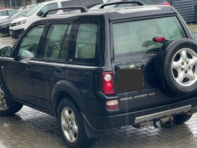 Черный Ленд Ровер Фрилендер, объемом двигателя 2 л и пробегом 290 тыс. км за 3262 $, фото 5 на Automoto.ua