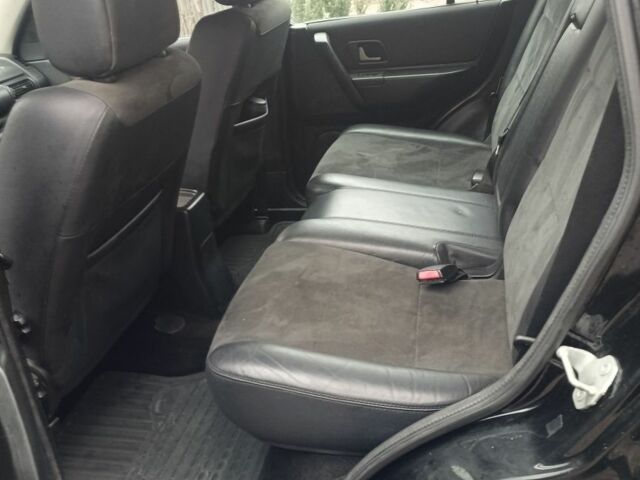 Черный Ленд Ровер Фрилендер, объемом двигателя 2 л и пробегом 259 тыс. км за 5777 $, фото 9 на Automoto.ua