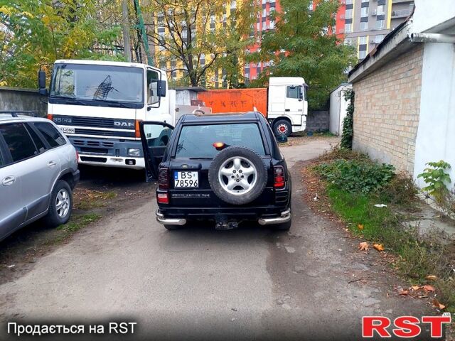 Черный Ленд Ровер Фрилендер, объемом двигателя 2 л и пробегом 150 тыс. км за 2750 $, фото 4 на Automoto.ua