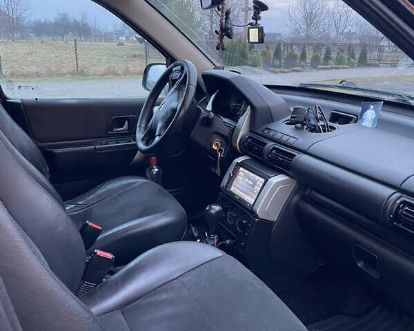 Чорний Ленд Ровер Freelander, об'ємом двигуна 1.95 л та пробігом 256 тис. км за 7100 $, фото 6 на Automoto.ua