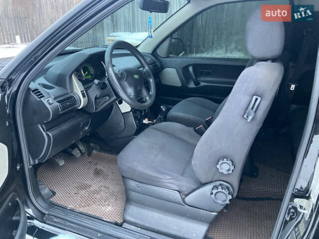 Черный Ленд Ровер Фрилендер, объемом двигателя 1.95 л и пробегом 256 тыс. км за 7300 $, фото 9 на Automoto.ua