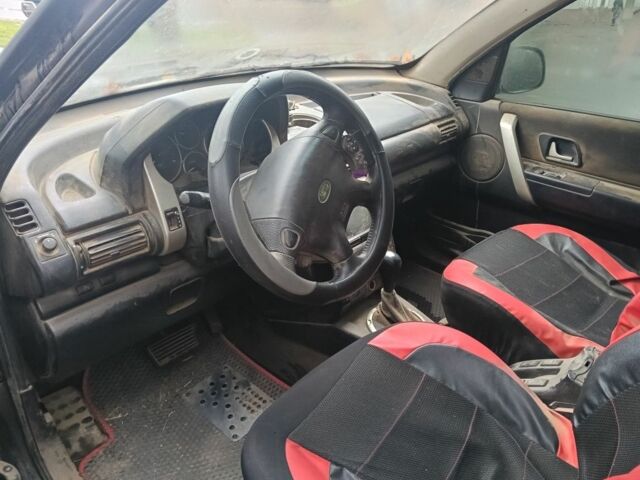 Черный Ленд Ровер Фрилендер, объемом двигателя 2 л и пробегом 178 тыс. км за 2365 $, фото 7 на Automoto.ua