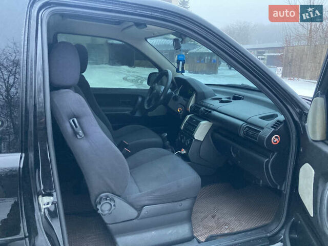 Черный Ленд Ровер Фрилендер, объемом двигателя 1.95 л и пробегом 256 тыс. км за 7300 $, фото 10 на Automoto.ua