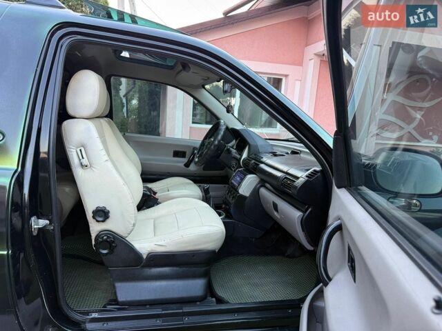 Чорний Ленд Ровер Freelander, об'ємом двигуна 2 л та пробігом 320 тис. км за 6200 $, фото 21 на Automoto.ua