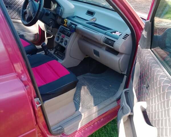 Червоний Ленд Ровер Freelander, об'ємом двигуна 1.99 л та пробігом 200 тис. км за 5000 $, фото 5 на Automoto.ua