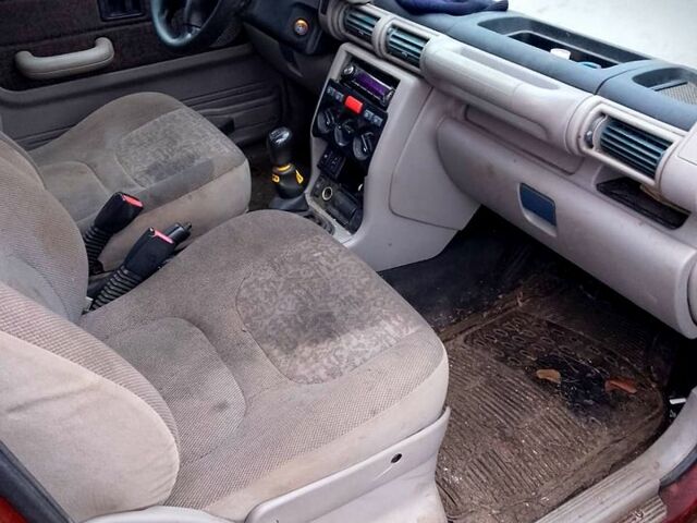 Червоний Ленд Ровер Freelander, об'ємом двигуна 2 л та пробігом 200 тис. км за 1650 $, фото 4 на Automoto.ua