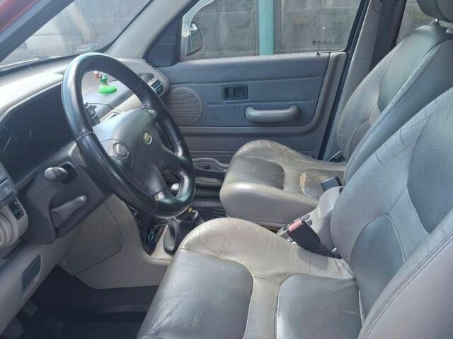 Червоний Ленд Ровер Freelander, об'ємом двигуна 1.8 л та пробігом 200 тис. км за 4500 $, фото 10 на Automoto.ua