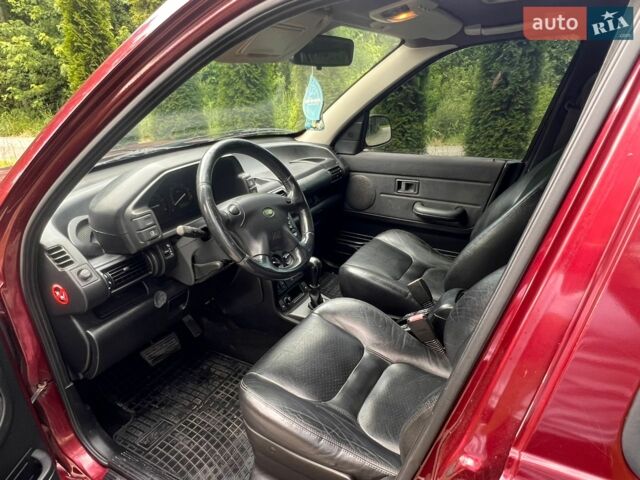 Червоний Ленд Ровер Freelander, об'ємом двигуна 2 л та пробігом 134 тис. км за 6799 $, фото 19 на Automoto.ua