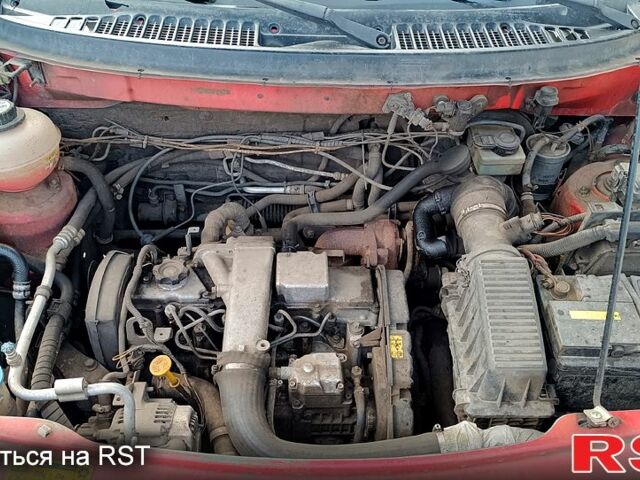 Червоний Ленд Ровер Freelander, об'ємом двигуна 2 л та пробігом 335 тис. км за 3500 $, фото 3 на Automoto.ua