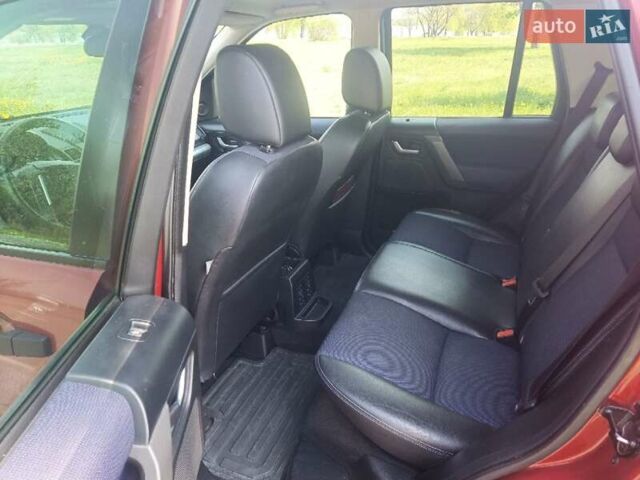 Красный Ленд Ровер Фрилендер, объемом двигателя 2.18 л и пробегом 260 тыс. км за 9499 $, фото 4 на Automoto.ua